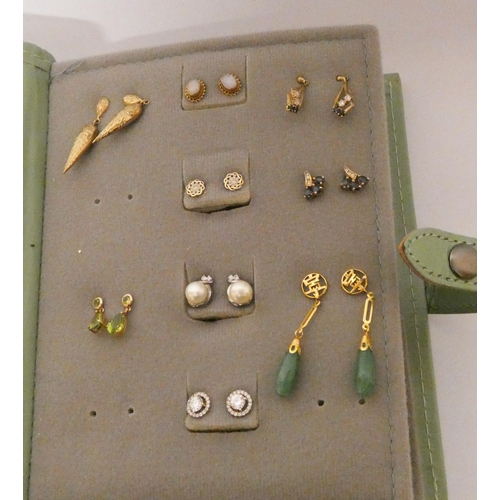 463 - A 'book' of earrings - containing 19 pairs of 9ct and other earrings