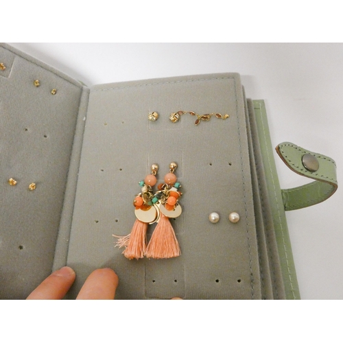 463 - A 'book' of earrings - containing 19 pairs of 9ct and other earrings