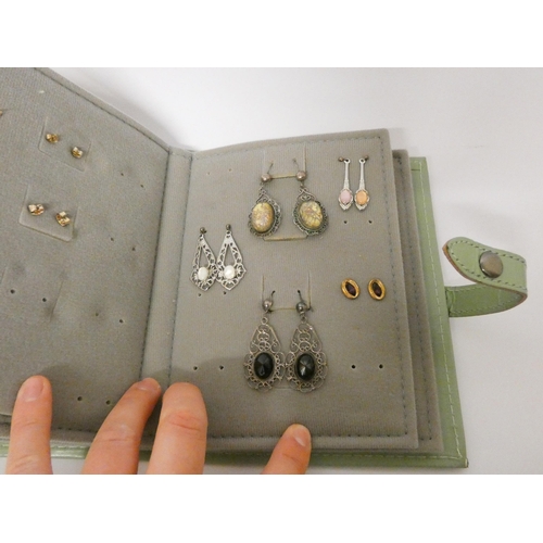 463 - A 'book' of earrings - containing 19 pairs of 9ct and other earrings