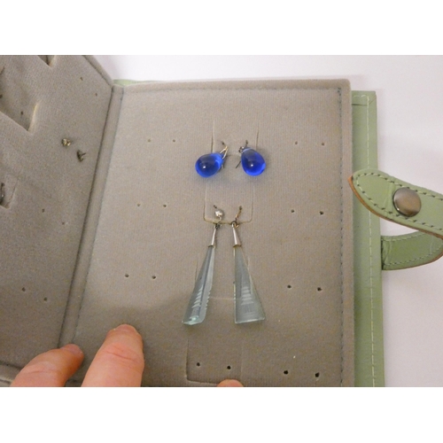 463 - A 'book' of earrings - containing 19 pairs of 9ct and other earrings