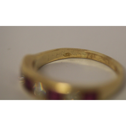 468 - 18ct gold ruby and diamond seven stone half hoop eternity ring, hallmarked, ring size N, weight 4.3g