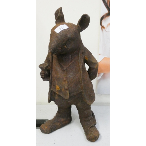 285 - A cast iron Mr Ratty ornament