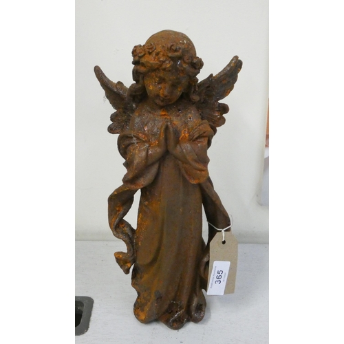 288 - A small cast iron rusty figure of an angel praying, 12