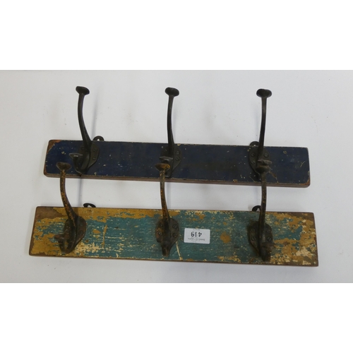 319 - Two triple coat racks