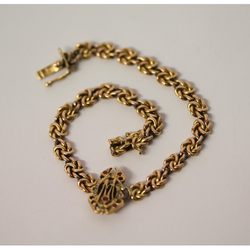 361 - Victorian 15ct gold chain link bracelet, the centre with intertwined ruby and diamond set initials C... 