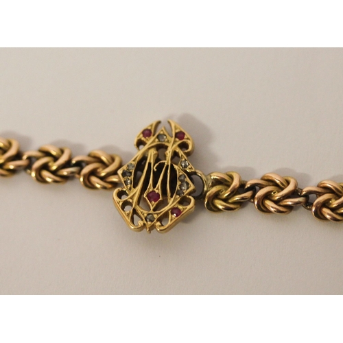 361 - Victorian 15ct gold chain link bracelet, the centre with intertwined ruby and diamond set initials C... 