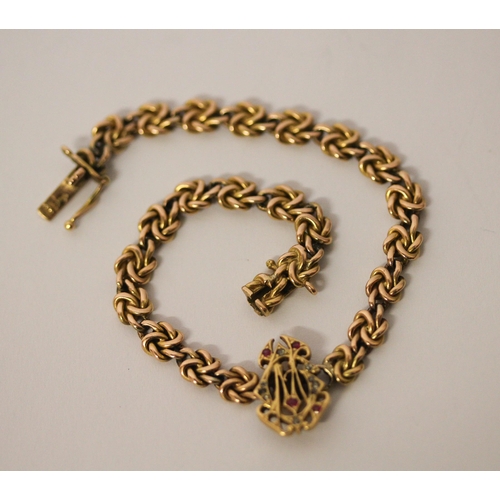 361 - Victorian 15ct gold chain link bracelet, the centre with intertwined ruby and diamond set initials C... 