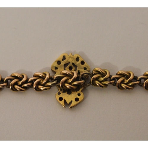 361 - Victorian 15ct gold chain link bracelet, the centre with intertwined ruby and diamond set initials C... 