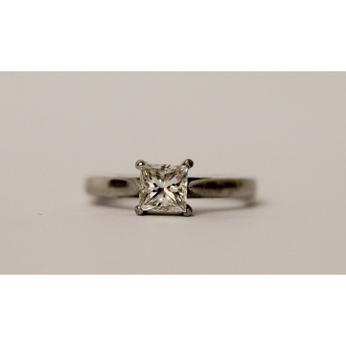 365 - A modern platinum and princess cut diamond engagement ring, the diamond weighing 0.75 carat in claw ... 