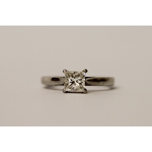 365 - A modern platinum and princess cut diamond engagement ring, the diamond weighing 0.75 carat in claw ... 