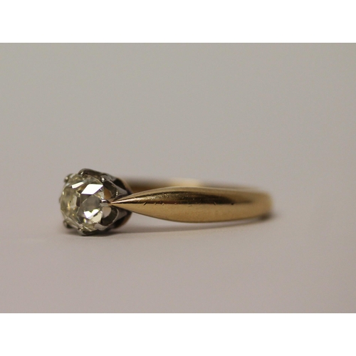 372 - An antique single stone old cut diamond solitaire ring on wide 14ct gold band, ring size Q