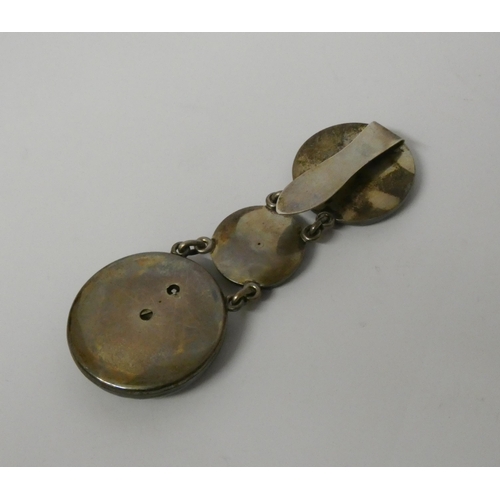 376 - Antique memorial chatelaine style fob watch, in black enamel circular case suspended from two furthe... 