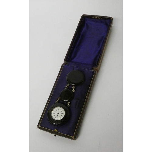 376 - Antique memorial chatelaine style fob watch, in black enamel circular case suspended from two furthe... 