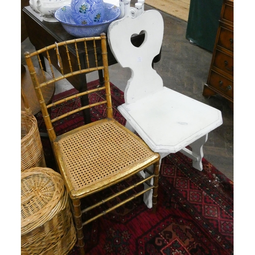 122 - A gilt bamboo effect bedroom chair with cane seat and a white painted hall chair