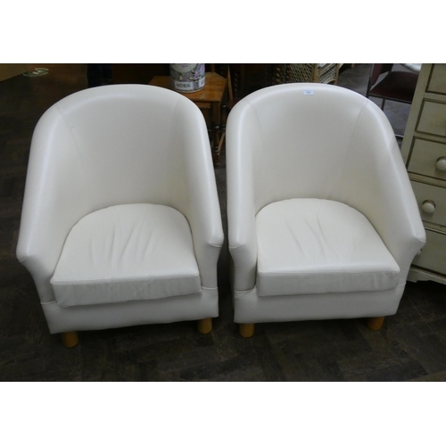 133 - A pair of cream faux leather modern tub chairs