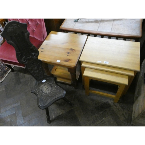 137 - A nest of three light oak graduated coffee tables, a square pine two tier table and a spinning chair