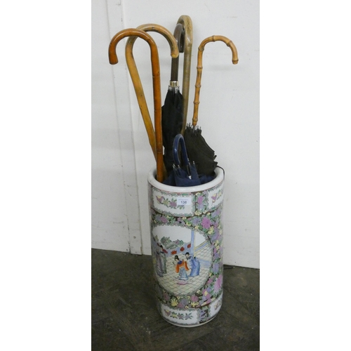 138 - A Cantonese style china stick stand and contents of umbrellas and walking canes