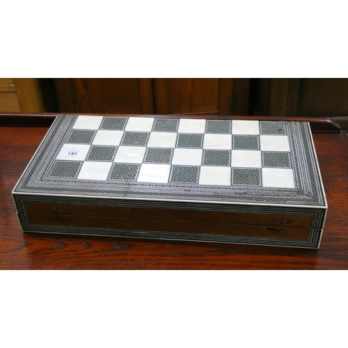 140 - A Victorian stained bone draughts set in Moroccan and bone inlaid travelling case