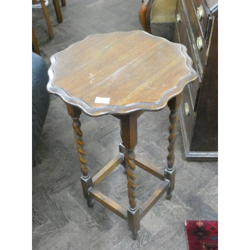 148 - A barley twist shaped top occasional table