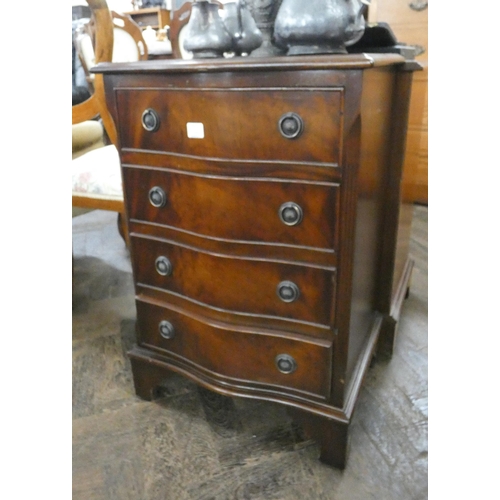 152 - Two similar mahogany chest of four long drawers each, both with serpentine fronts