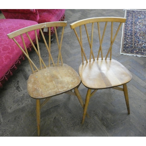 153 - A set of six blonde elm Ercol candlestick chairs