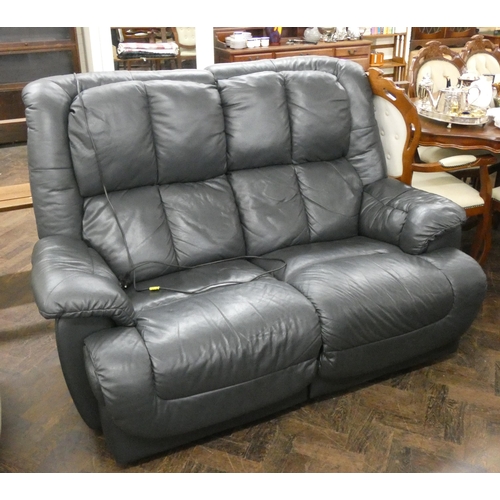 169 - A charcoal grey two seater leather electrically operated reclining sofa