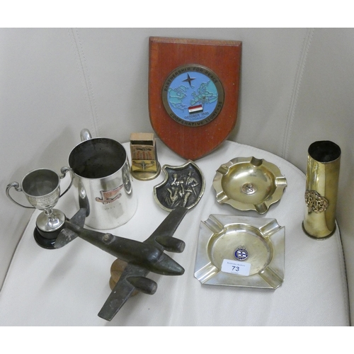 73 - Ashtrays, plaques, model airplane, tankard etc