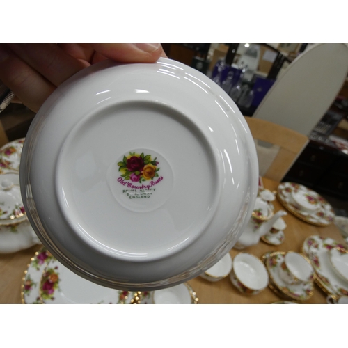 86 - A quantity of Royal Albert Old Country Roses dinner, tea and coffee ware, 85 pieces