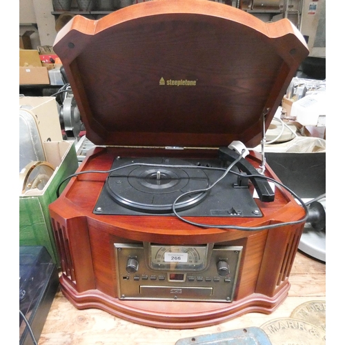 266 - A radio CD player in old wooden style case