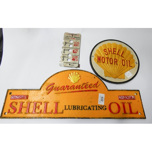 269 - An old cast iron wall hanging 'Shell Lubricating Oil' sign, an old 'Shell Motor' sign and a small Ch... 