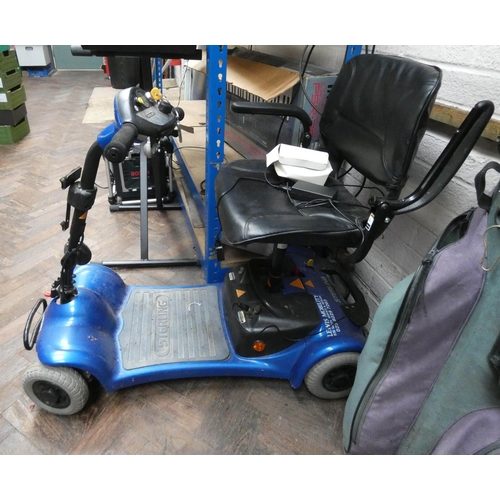 291 - A Sterling four wheel mobility scooter with charger - not working probably new battery required