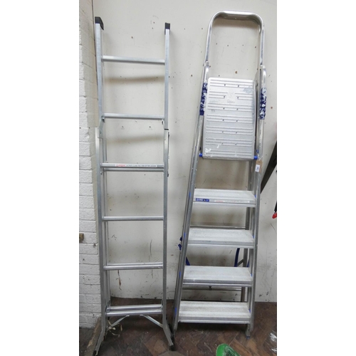 295 - A set of fold-up aluminium step ladders and one other ladder