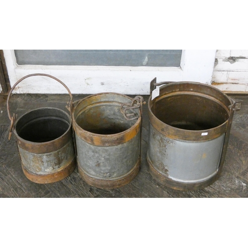 396 - A set of three graduated in size heavy milk buckets