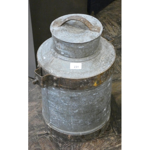 426 - An old galvanised style milk churn