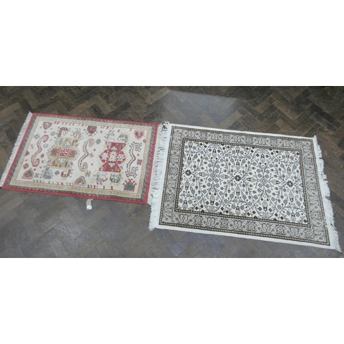 220 - Two small wool pile rugs