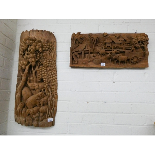 224 - Two Indian carved wood wall plaques