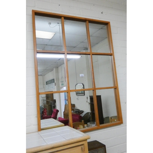 229 - A large oak framed window style wall mirror, 42