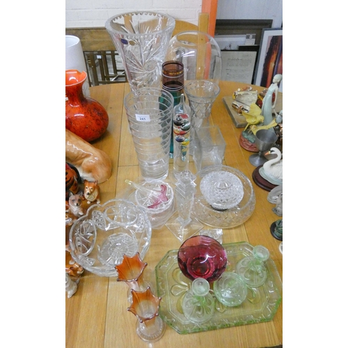 241 - A large cut glass trumpet shaped vase, Galileo thermometer. other glass ware, bowls etc