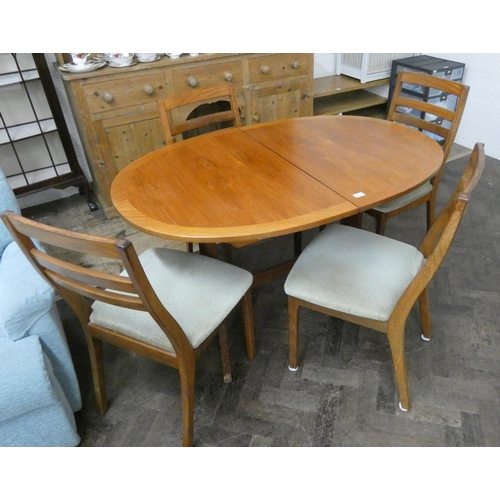 256 - Nathan teak oval extending dining table with cross banded top and 4 ladder back style chairs