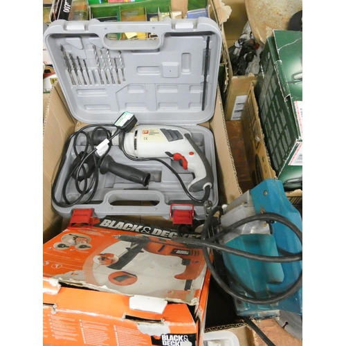 381 - An electric hammer drill in carrying case, Black & decker electric hammer drill and a jig saw