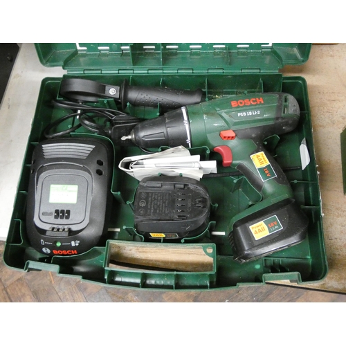 387 - A Bosch 18 volt cordless rechargeable drill with charger and spare battery in carrying case