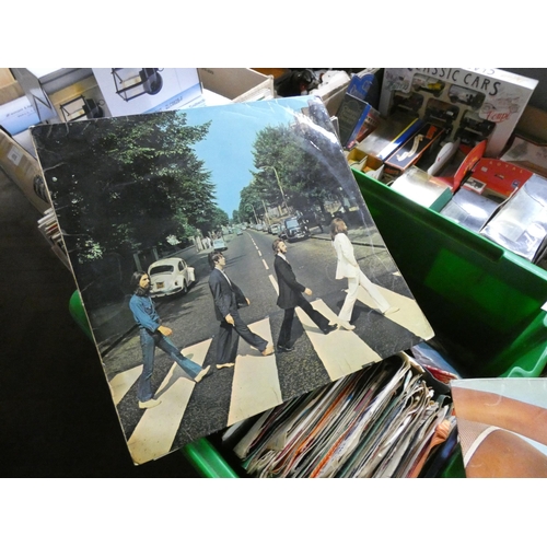 407 - A quantity of vinyl LP records including Beatle Abbey Road, some other pop and a quantity of single ... 