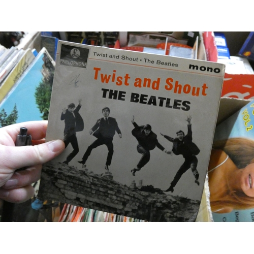 407 - A quantity of vinyl LP records including Beatle Abbey Road, some other pop and a quantity of single ... 