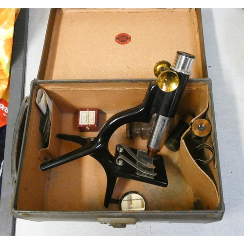 446 - Old N&S microscope in small leather carrying case