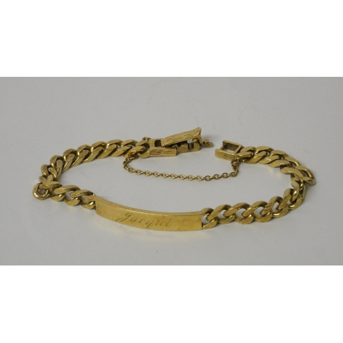 532 - 9ct yellow gold identity bracelet, hallmarked, with safety chain. Weight 20.9g