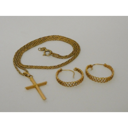 534 - A pair of 9ct gold hoop earrings and a 9ct gold cross pendant on chain. Weight 7.3g