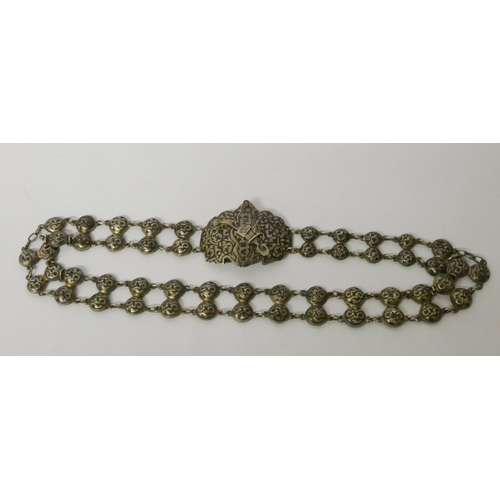 600 - A late 19th century Russian silver and niello waist belt and buckle, 70cms long approx, marked. 132g