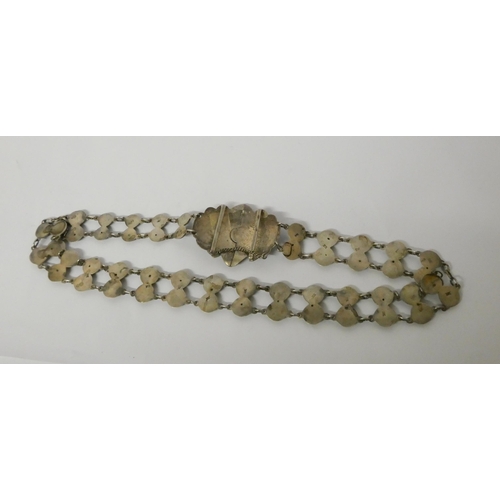 600 - A late 19th century Russian silver and niello waist belt and buckle, 70cms long approx, marked. 132g