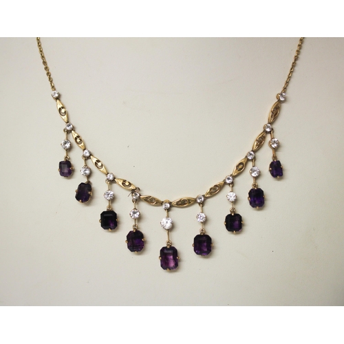 607 - An antique amethyst and white sapphire fringe necklace, in unmarked yellow metal. Gross weight 19.1g... 