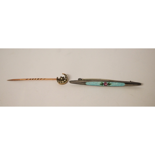 642 - An Edwardian pearl crescent moon stick pin and a floral enamel decorated bar brooch